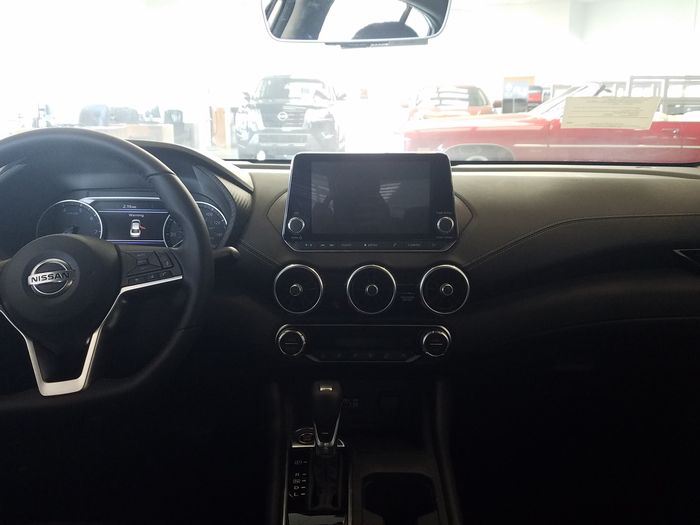 Dash centre console with a screen sitting flush in its fit frame
