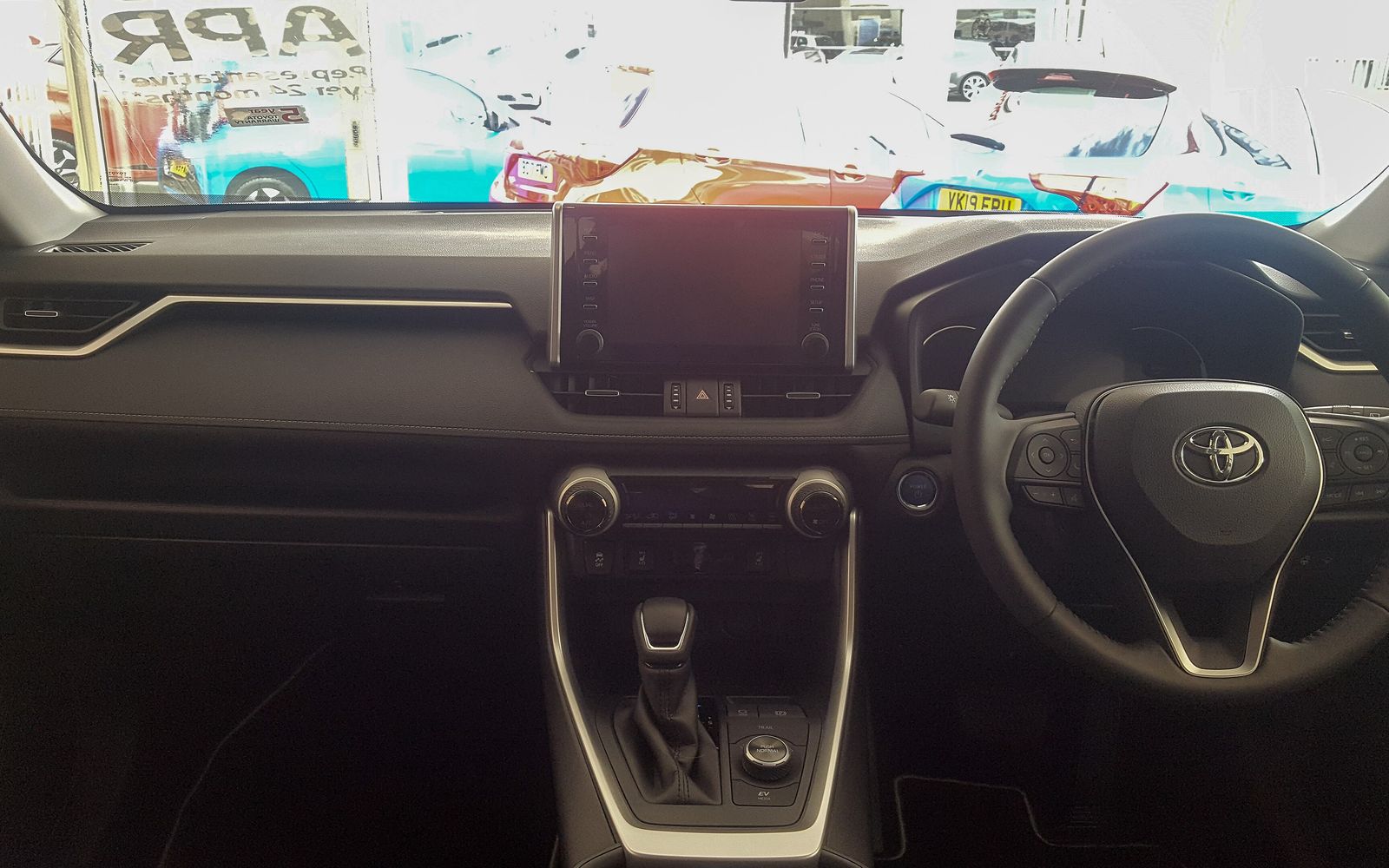 Touchscreen radio sitting flush in a car dashboard