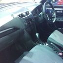 Dashboard of a 2011–2017 Suzuki Swift, where the 9" fit frame goes