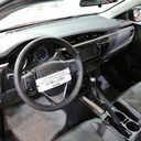 Dashboard of a 2014 Toyota Corolla, where the 10" fit frame goes