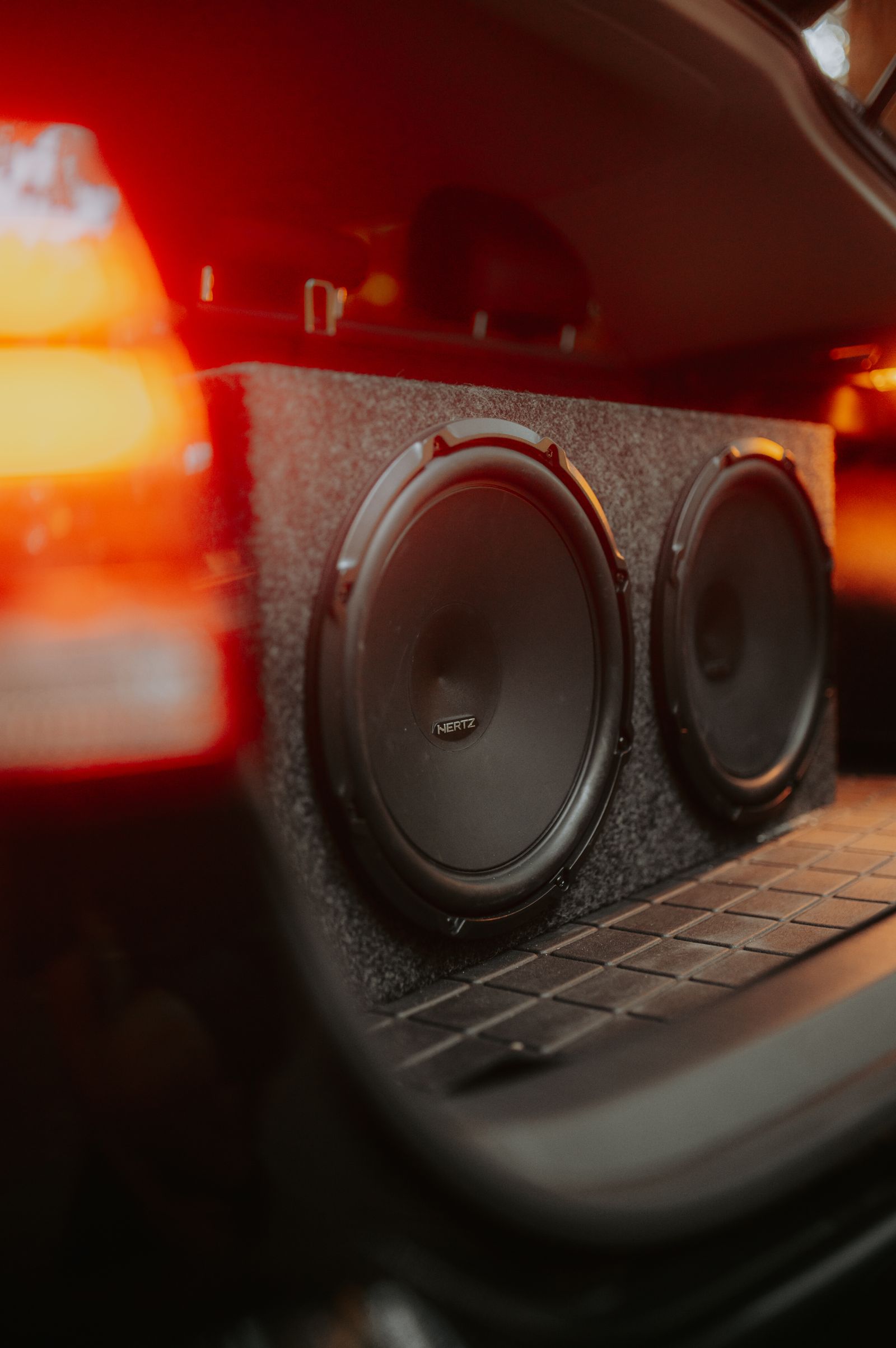 Subwoofers installed in a car boot